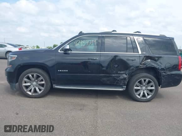 2016 Chevrolet Tahoe LTZ with VIN 1GNSKCKC4GR219987, listed as a IAAI auction lot 42934019 with 158,137 mi miles and . Bid and sale history available at DreamBid. Image 14.