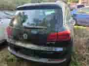 2015 Volkswagen Tiguan S with VIN WVGAV7AX6FW592015, listed as a IAAI auction lot 41897520 with 104,355 mi miles and . Bid and sale history available at DreamBid. Image 4.