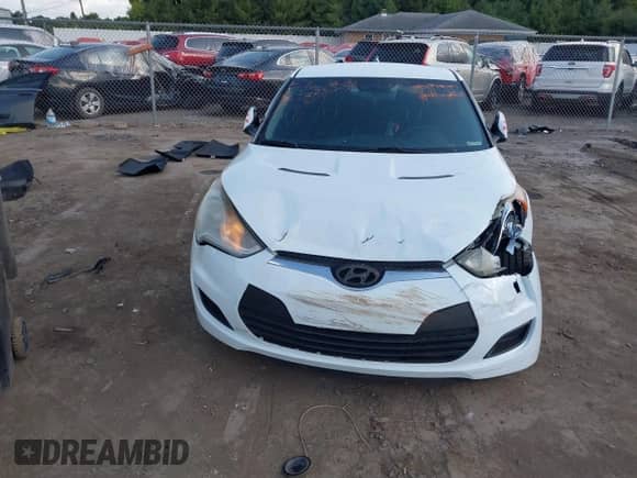 2014 Hyundai Veloster z VIN KMHTC6AD0EU204382, wystawiony jako IAAI lot #40287015 z przebiegiem 110 460 mil mil oraz . Historia ofert i sprzedaży dostępna na DreamBid. Obrazek 13.