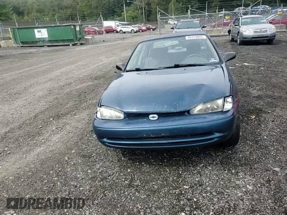1999 Chevrolet Prizm с VIN 1Y1SK5284XZ409543, выставлен на аукционе Copart как лот 84379805 с пробегом Не указан миль и Списание • Salvage title. История ставок и продаж доступна на DreamBid. Изображение 13.