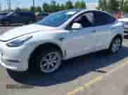 2023 Tesla Model Y Long Range z VIN 7SAYGDEE9PA081036, wystawiony jako IAAI lot #43151161 z przebiegiem 49 637 mil mil oraz . Historia ofert i sprzedaży dostępna na DreamBid. Obrazek 2.