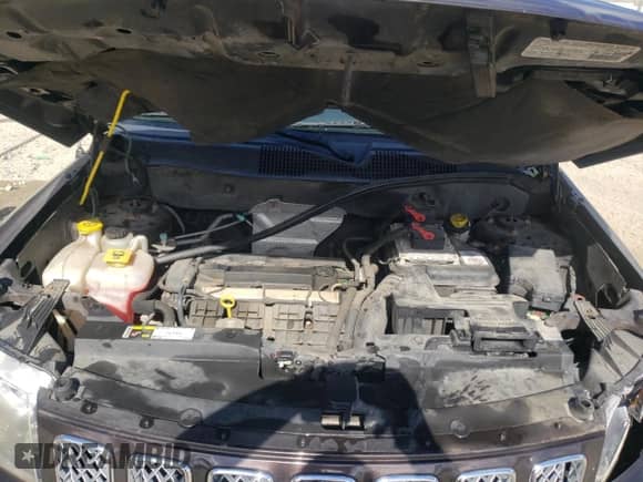 2014 Jeep Compass Latitude with VIN 1C4NJCEA4ED643134, listed as a Copart auction lot 71044335 with 103,025 mi miles and Salvage title. Bid and sale history available at DreamBid. Image 12.