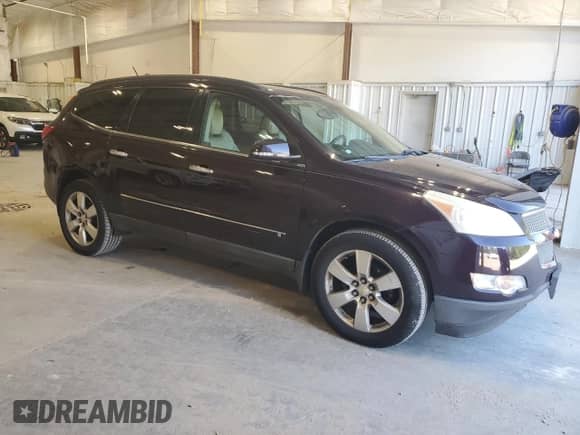 2009 Chevrolet Traverse LTZ with VIN 1GNEV33D29S132547, listed as a Copart auction lot 70061145 with 130,931 mi miles and Clean title. Bid and sale history available at DreamBid. Image 4.