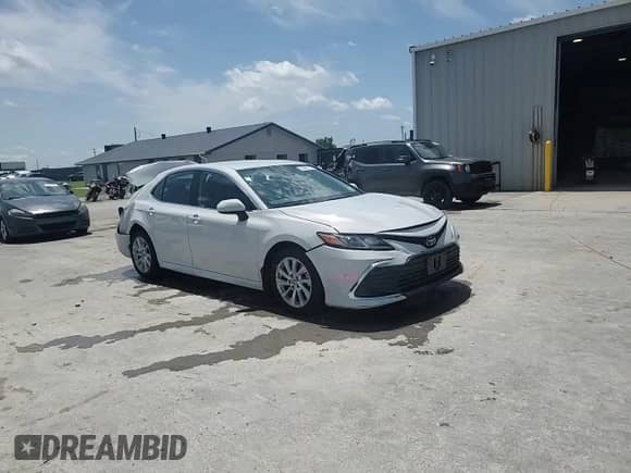 2023 Toyota Camry LE z VIN 4T1C11AK1PU184167, wystawiony jako Copart lot #63689135 z przebiegiem 42 134 mil mil oraz Szkoda całkowita • Salvage title. Historia ofert i sprzedaży dostępna na DreamBid. Obrazek 14.