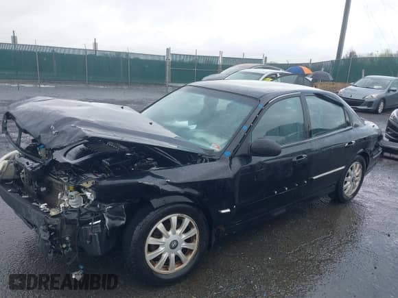 2005 Hyundai Sonata GLS z VIN KMHWF35H55A141085, wystawiony jako IAAI lot #39112075 z przebiegiem 157 941 mil mil oraz . Historia ofert i sprzedaży dostępna na DreamBid. Obrazek 2.