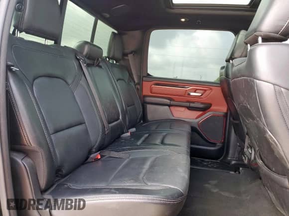 2020 Ram 1500 Rebel z VIN 1C6SRFLT6LN127034, wystawiony jako Copart lot #64791005 z przebiegiem 86 689 mil mil oraz Szkoda całkowita • Salvage title. Historia ofert i sprzedaży dostępna na DreamBid. Obrazek 10.