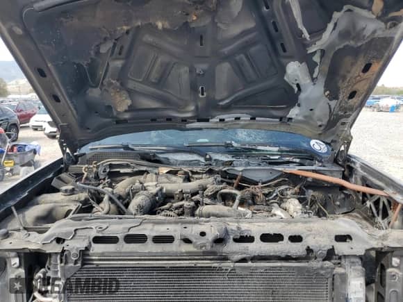 2015 Chevrolet Silverado 2500HD LTZ z VIN 1GC1KWE86FF110363, wystawiony jako Copart lot #71321545 z przebiegiem Nie podano mil oraz Szkoda całkowita • Salvage title. Historia ofert i sprzedaży dostępna na DreamBid. Obrazek 11.