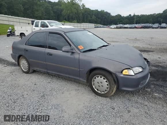 1994 Honda Civic with VIN 1HGEG8658RL009528, listed as a Copart auction lot 70803805 with 195,525 mi miles and Salvage title. Bid and sale history available at DreamBid. Image 4.