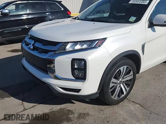2021 Mitsubishi Outlander SE z VIN JA4APVAUXMU015757, wystawiony jako Copart lot #85944485 z przebiegiem 106 985 mil mil oraz Szkoda całkowita • Salvage title. Historia ofert i sprzedaży dostępna na DreamBid. Obrazek 14.