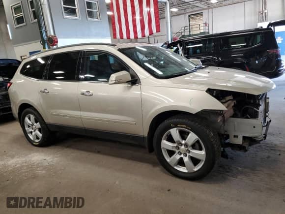 2016 Chevrolet Traverse LT z VIN 1GNKVGKD4GJ259315, wystawiony jako Copart lot #71059355 z przebiegiem 96 421 mil mil oraz Szkoda całkowita • Salvage title. Historia ofert i sprzedaży dostępna na DreamBid. Obrazek 4.