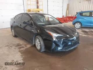 2016 Toyota Prius Four z VIN JTDKARFU2G3004385, wystawiony jako IAAI lot #42442835 z przebiegiem 121 504 mil mil oraz . Historia ofert i sprzedaży dostępna na DreamBid. Obrazek 1.