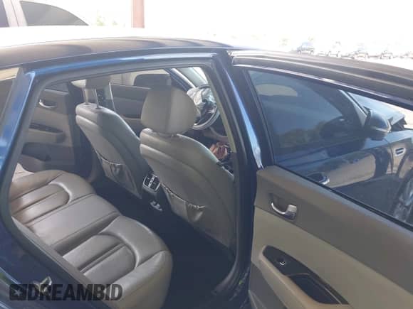 2016 Kia Optima EX with VIN 5XXGU4L31GG005233, listed as a IAAI auction lot 42763818 with 131,055 mi miles and . Bid and sale history available at DreamBid. Image 8.