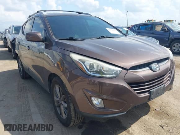 2014 Hyundai Tucson Limited with VIN KM8JUCAG7EU888876, listed as a IAAI auction lot 42509769 with 143,811 mi miles and . Bid and sale history available at DreamBid. Image 1.