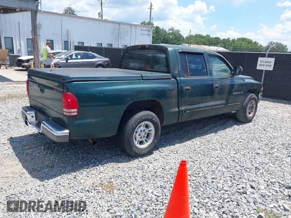 2000 Dodge Dakota Sport with VIN 1B7GL2AX1YS634818, listed as a IAAI auction lot 42859891 with 132,734 mi miles and . Bid and sale history available at DreamBid. Image 4.