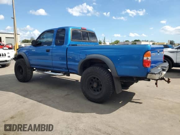 2004 Toyota Tacoma PreRunner with VIN 5TESN92N54Z340774, listed as a Copart auction lot 82484455 with 147,005 mi miles and Salvage title. Bid and sale history available at DreamBid. Image 2.