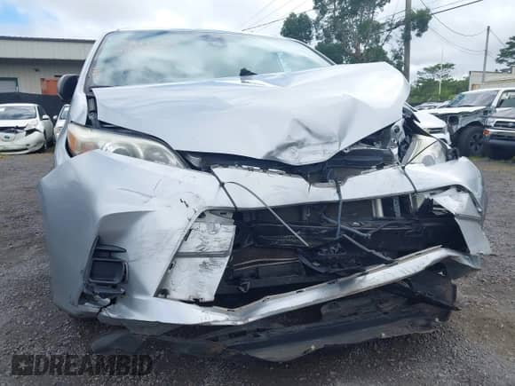 2019 Toyota Sienna L with VIN 5TDZZ3DC2KS005851, listed as a IAAI auction lot 41992778 with 99,580 mi miles and . Bid and sale history available at DreamBid. Image 6.