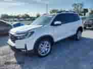 2025 Honda Passport EX-L with VIN 5FNYF8H57SB014949, listed as a Copart auction lot 58587185 with 4,403 mi miles and Salvage title. Bid and sale history available at DreamBid. Image 1.