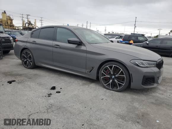 2022 BMW 5 Series 540i z VIN WBA53BJ02NWX48709, wystawiony jako Copart lot #46219995 z przebiegiem 42 719 mil mil oraz Szkoda całkowita • Salvage title. Historia ofert i sprzedaży dostępna na DreamBid. Obrazek 4.