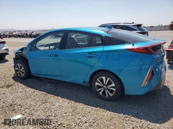 2018 Toyota Prius Plus with VIN JTDKARFP9J3081286, listed as a Copart auction lot 67827655 with 131,432 mi miles and Salvage title. Bid and sale history available at DreamBid. Image 2.