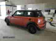 2013 MINI Hardtop S with VIN WMWSV3C52DT396176, listed as a Copart auction lot 59207165 with 104,194 mi miles and Salvage title. Bid and sale history available at DreamBid. Image 2.