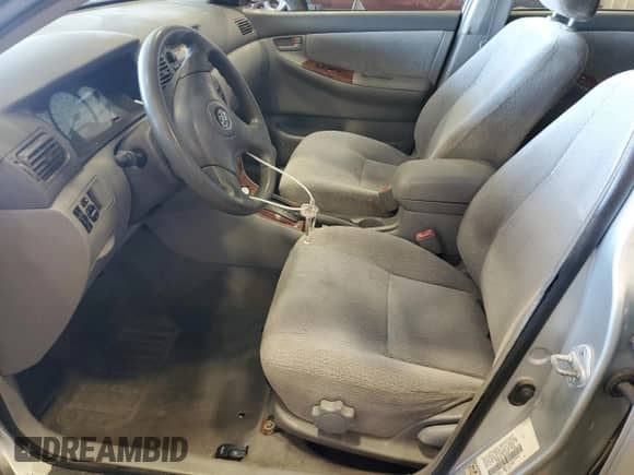 2003 Toyota Corolla CE с VIN JTDBR32E732008565, выставлен на аукционе Copart как лот 85352315 с пробегом 143 496 миль миль и Списание • Salvage title. История ставок и продаж доступна на DreamBid. Изображение 7.