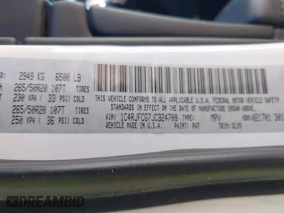 2018 Jeep Grand Cherokee Overland with VIN 1C4RJFCG7JC324708, listed as a IAAI auction lot 43294688 with 131,457 mi miles and . Bid and sale history available at DreamBid. Image 9.
