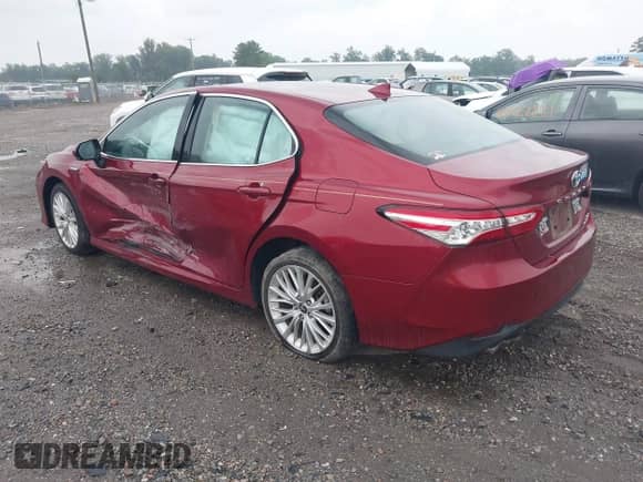 2020 Toyota Camry Hybrid XLE with VIN 4T1F31AK5LU016727, listed as a IAAI auction lot 42885382 with 14,854 mi miles and . Bid and sale history available at DreamBid. Image 3.