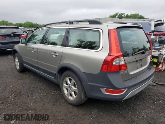 2011 Volvo XC70 3.2L with VIN YV4940BZ2B1114888, listed as a Copart auction lot 57097495 with 136,144 mi miles and Salvage title. Bid and sale history available at DreamBid. Image 2.