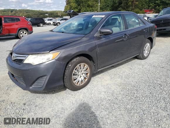2014 Toyota Camry SE с VIN 4T1BF1FK7EU767216, выставлен на аукционе Copart как лот 85265055 с пробегом 173 390 миль миль и Списание • Salvage title. История ставок и продаж доступна на DreamBid. Изображение 1.