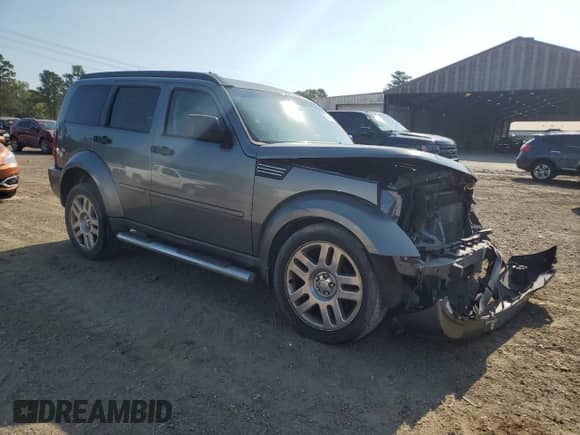 2011 Dodge Nitro Heat with VIN 1D4PT4GX7BW606656, listed as a Copart auction lot 58949295 with 95,496 mi miles and Salvage title. Bid and sale history available at DreamBid. Image 4.