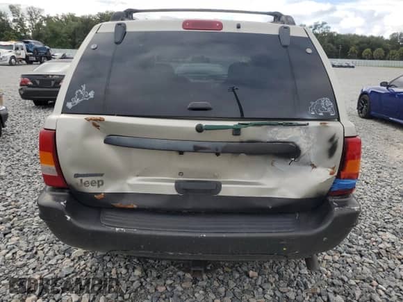 2004 Jeep Grand Cherokee Laredo with VIN 1J4GX48S04C301566, listed as a Copart auction lot 86159575 with 195,483 mi miles and Salvage title. Bid and sale history available at DreamBid. Image 6.