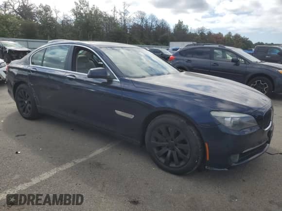2011 BMW 7 Series 750i with VIN WBAKA8C53BCY36671, listed as a Copart auction lot 70638945 with 126,739 mi miles and Salvage title. Bid and sale history available at DreamBid. Image 4.