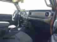 2022 Jeep Wrangler Unlimited Willys с VIN 1C4HJXDN1NW144112, выставлен на аукционе IAAI как лот 41867571 с пробегом 63 876 миль миль и . История ставок и продаж доступна на DreamBid. Изображение 5.