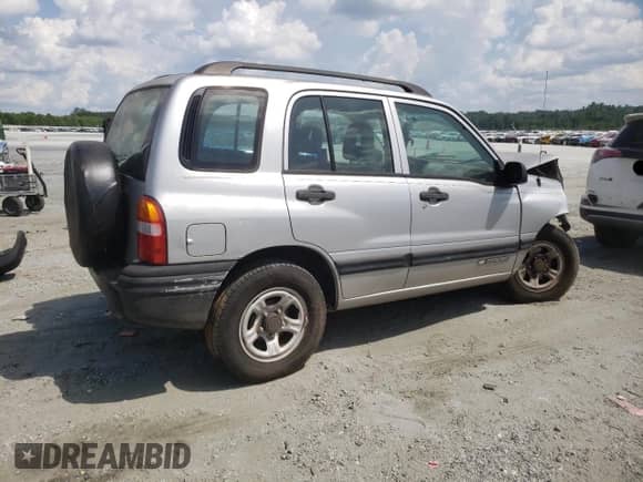 2003 Chevrolet Tracker с VIN 2CNBE13C136914772, выставлен на аукционе Copart как лот 64744475 с пробегом Не указан миль и Списание • Salvage title. История ставок и продаж доступна на DreamBid. Изображение 3.