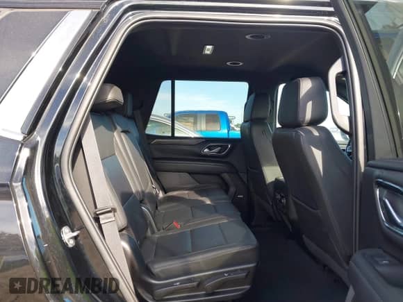 2023 Chevrolet Tahoe LT z VIN 1GNSCNKD9PR191296, wystawiony jako IAAI lot #41814835 z przebiegiem 64 777 mil mil oraz . Historia ofert i sprzedaży dostępna na DreamBid. Obrazek 8.