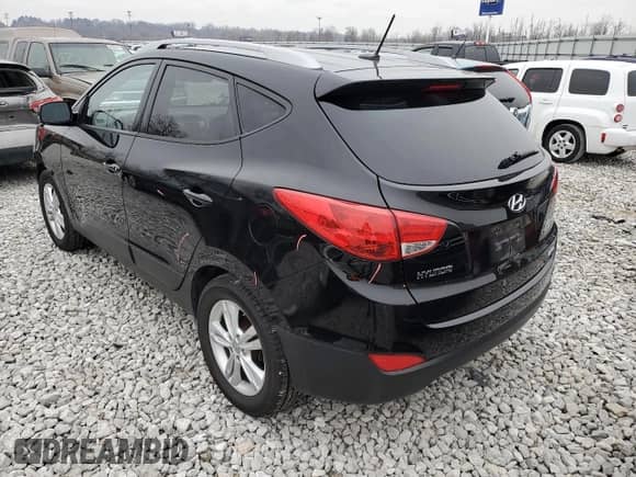 2011 Hyundai Tucson Limited with VIN KM8JUCAC6BU278234, listed as a Copart auction lot 85894464 with 148,933 mi miles and Salvage title. Bid and sale history available at DreamBid. Image 2.