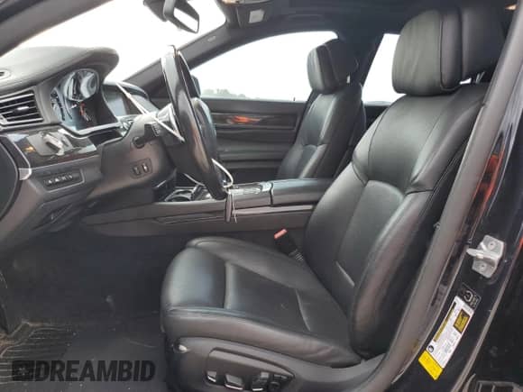 2013 BMW 7 Series 750i с VIN WBAYA8C56DC996704, выставлен на аукционе Copart как лот 64466705 с пробегом 102 278 миль миль и Списание • Salvage title. История ставок и продаж доступна на DreamBid. Изображение 7.