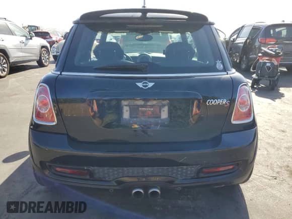 2012 MINI Hardtop S with VIN WMWSV3C59CT387246, listed as a Copart auction lot 61766125 with 155,156 mi miles and Salvage title. Bid and sale history available at DreamBid. Image 6.