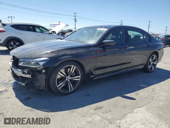 2019 BMW 7 Series 750i with VIN WBA7F0C51KGM26016, listed as a Copart auction lot 69878925 with 61,266 mi miles and Salvage title. Bid and sale history available at DreamBid. Image 1.