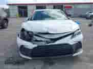 2021 Toyota Camry LE with VIN 4T1C11AK8MU601313, listed as a IAAI auction lot 43383218 with 34,384 mi miles and . Bid and sale history available at DreamBid. Image 12.