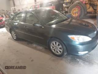 2003 Toyota Camry LE with VIN 4T1BF30K33U565250, listed as a IAAI auction lot 42835921 with 133,971 mi miles and . Bid and sale history available at DreamBid. Image 1.