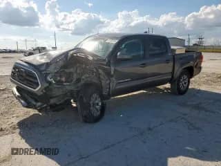 2019 Toyota Tacoma SR5 with VIN 5TFAZ5CN3KX077499, listed as a Copart auction lot 62183125 with 131,978 mi miles and Salvage title. Bid and sale history available at DreamBid. Image 1.