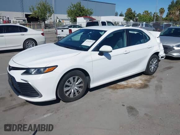 2022 Toyota Camry Hybrid LE with VIN 4T1C31AK4NU583386, listed as a IAAI auction lot 42532572 with 151,289 mi miles and . Bid and sale history available at DreamBid. Image 18.