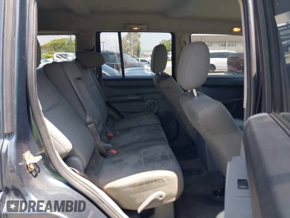 2007 Jeep Commander Sport with VIN 1J8HH48KX7C548033, listed as a IAAI auction lot 42555217 with 213,236 mi miles and . Bid and sale history available at DreamBid. Image 8.