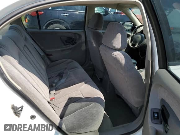 1998 Chevrolet Malibu LS z VIN 1G1NE52M8WY158738, wystawiony jako Copart lot #65030854 z przebiegiem 84 739 mil mil oraz Nie do naprawy • Non repairable. Historia ofert i sprzedaży dostępna na DreamBid. Obrazek 10.