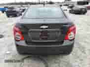 2013 Chevrolet Sonic LS с VIN 1G1JA5SG7D4241036, выставлен на аукционе Copart как лот 54960174 с пробегом 132 465 миль миль и Списание • Salvage title. История ставок и продаж доступна на DreamBid. Изображение 6.