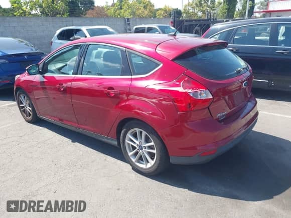 2014 Ford Focus Titanium z VIN 1FADP3N24EL158443, wystawiony jako IAAI lot #42801477 z przebiegiem 116 859 mil mil oraz . Historia ofert i sprzedaży dostępna na DreamBid. Obrazek 3.