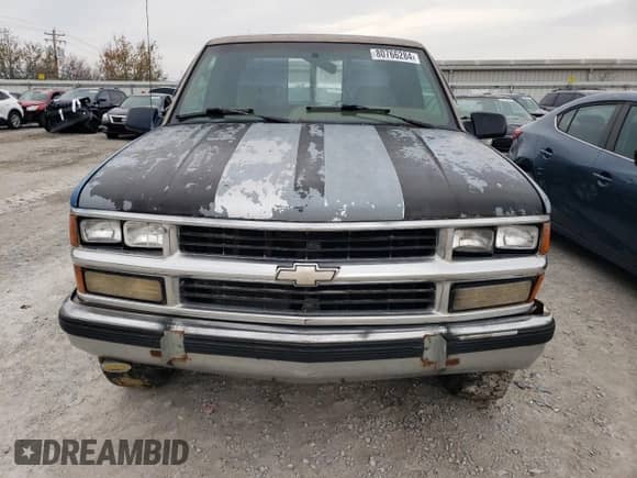 1995 Chevrolet Silverado 2500 с VIN 1GCFK29K4SE105201, выставлен на аукционе Copart как лот 80766284 с пробегом 147 805 миль миль и Списание • Salvage title. История ставок и продаж доступна на DreamBid. Изображение 5.