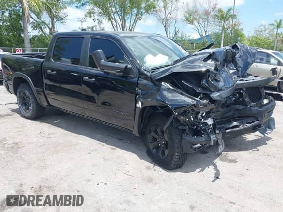 2024 Ram 1500 Rebel z VIN 1C6SRFLT3RN110362, wystawiony jako IAAI lot #42310127 z przebiegiem 6 607 mil mil oraz . Historia ofert i sprzedaży dostępna na DreamBid. Obrazek 1.