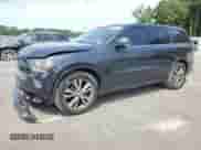 2013 Dodge Durango R/T with VIN 1C4SDJCTXDC674489, listed as a Copart auction lot 70504985 with 237,923 mi miles and Salvage title. Bid and sale history available at DreamBid. Image 1.